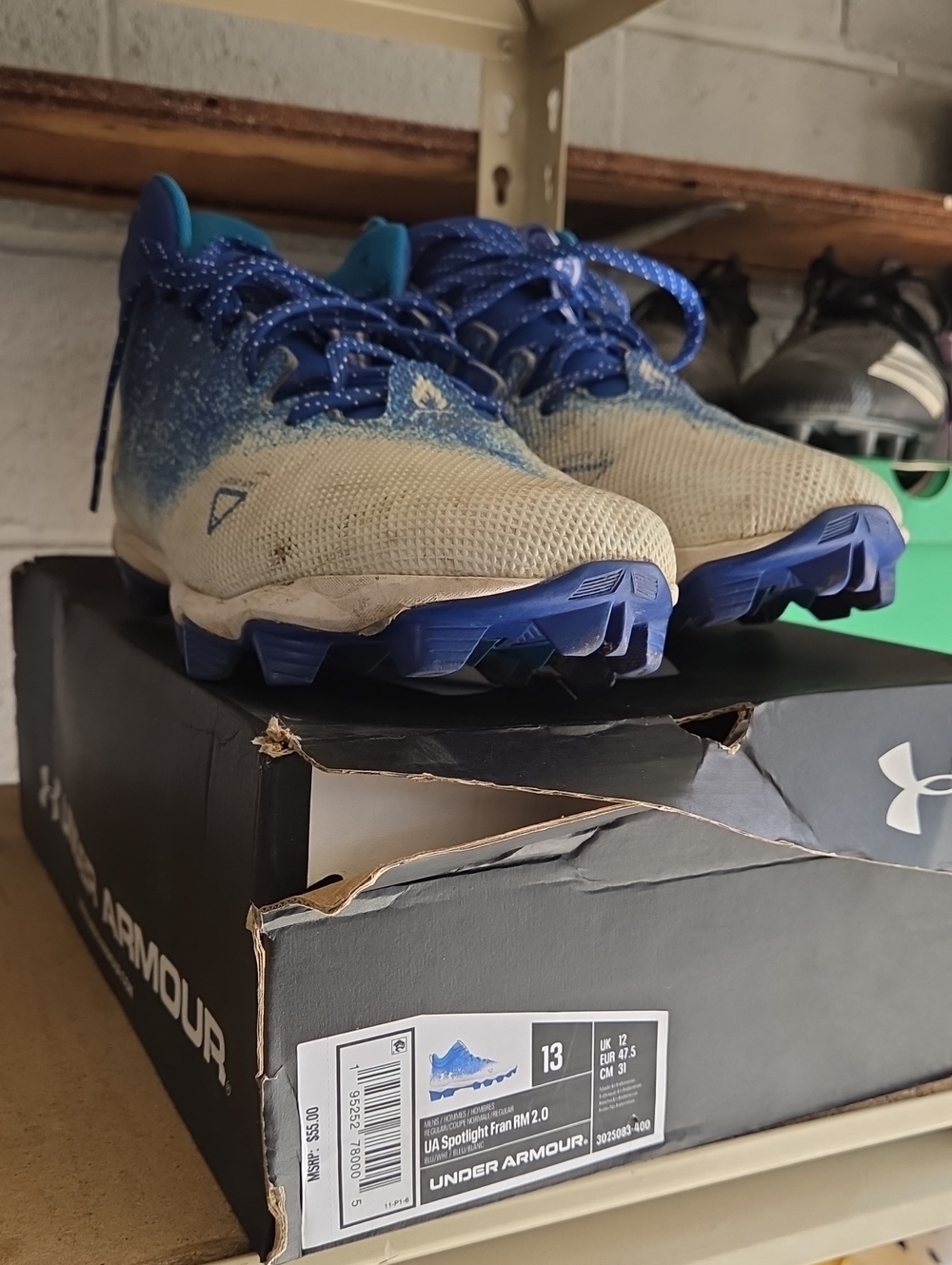 Under Armour Cream and Blue Athletic Cleats